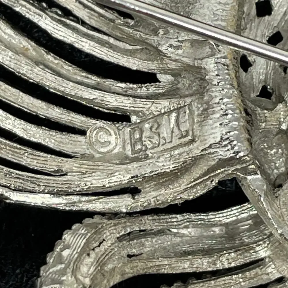 BSK Vintage Brooch Silver Tone Metal Openwork Ring With Textured Rope Spray
